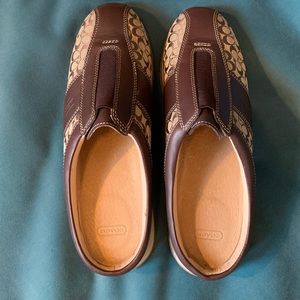 Coach signature slide on mules.